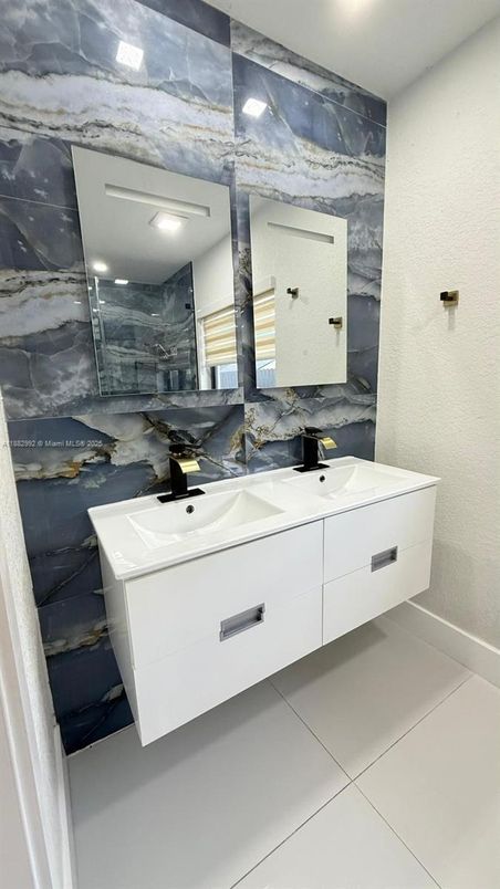 Bathroom, Dual Sink Vanities, Interior, Marble Walls, Recessed Lighting