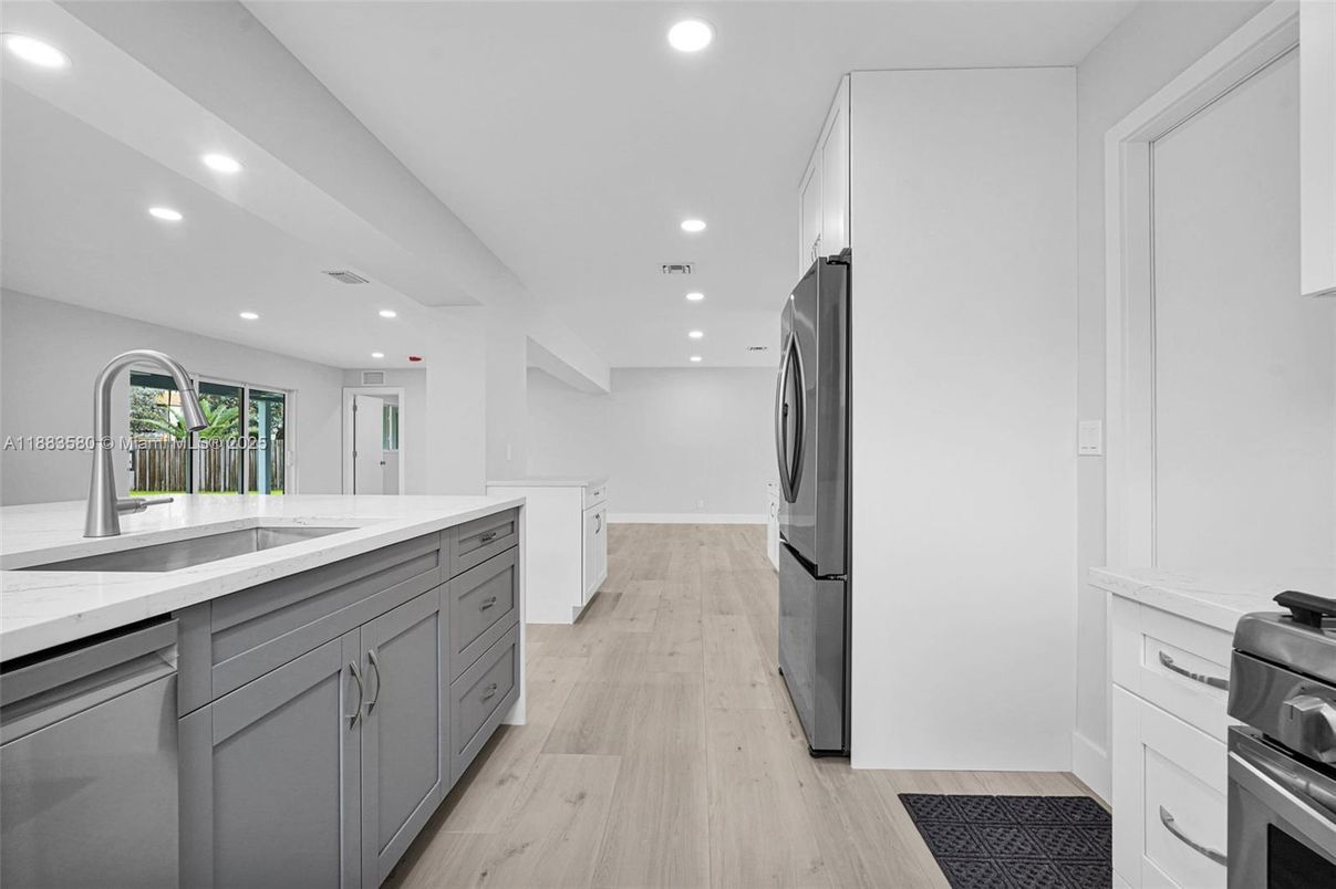 Interior, Kitchen, Recessed Lighting, Stainless Steel Appliances, Wood Texture Flooring