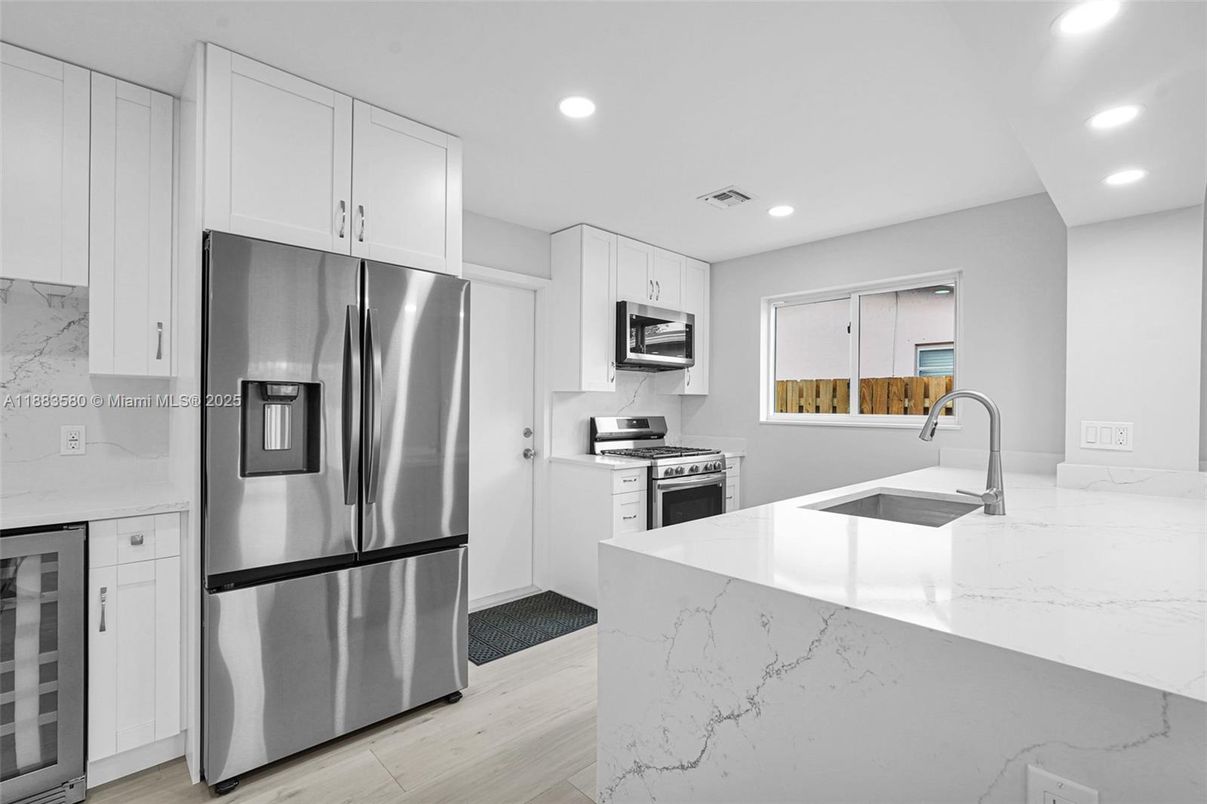 Interior, Kitchen, Recessed Lighting, Stainless Steel Appliances, Wood Texture Flooring