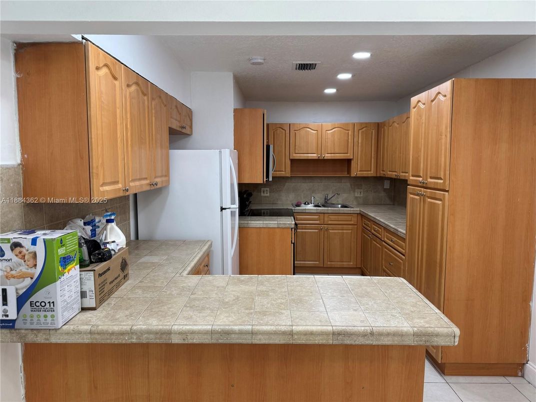 Interior, Kitchen, Recessed Lighting, Tile Countertops