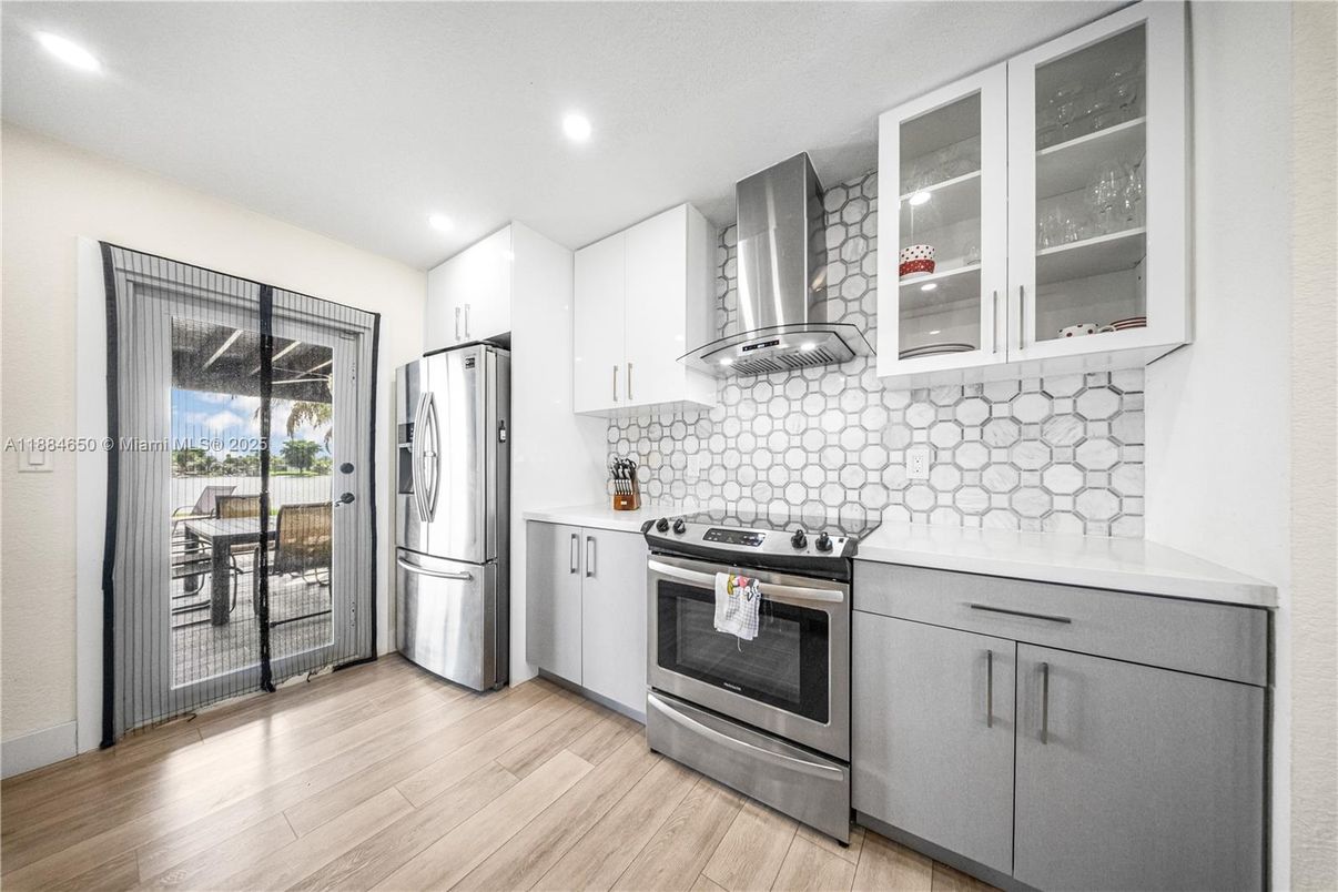 Interior, Kitchen, Recessed Lighting, Stainless Steel Appliances, Wood Texture Flooring