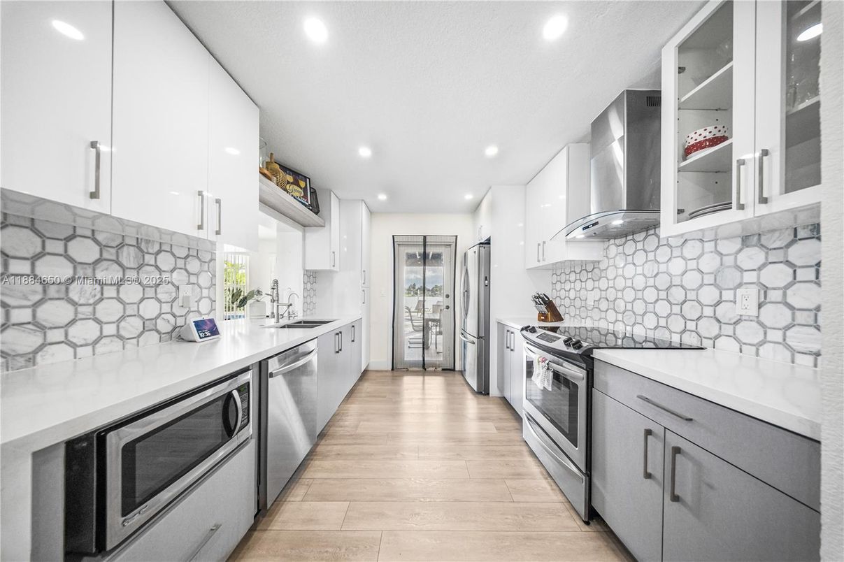 Interior, Kitchen, Recessed Lighting, Stainless Steel Appliances, Wood Texture Flooring