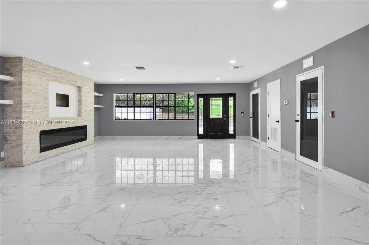 Empty room, Fireplace, Interior, Marble, Recessed Lighting, Stone Walls