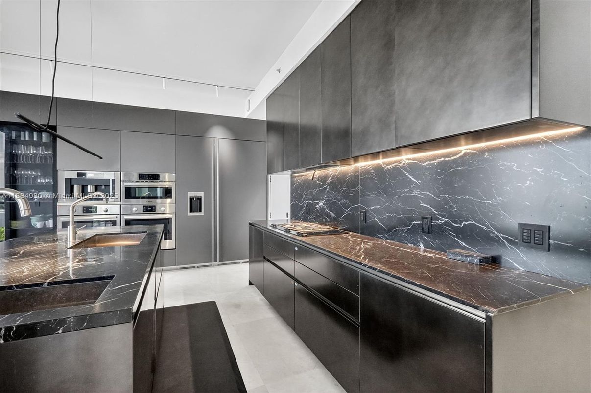 Interior, Kitchen, Marble Walls, Pendant Lights, Stainless Steel Appliances