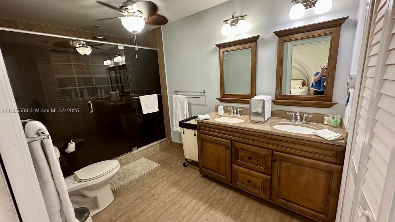 Bathroom, Dual Sink Vanities, Glass Shower, Interior, Wood Texture Flooring