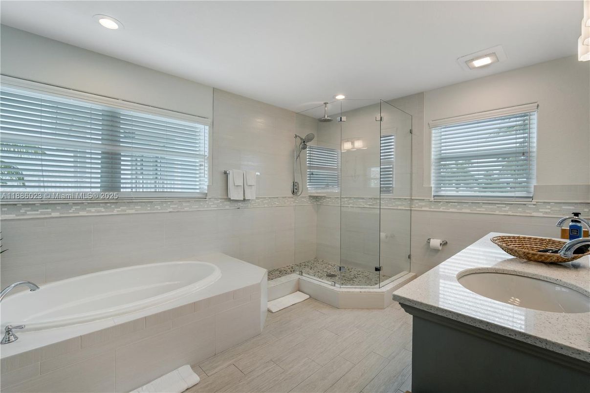 Bathroom, Dual Sink Vanities, Glass Shower, Interior, Recessed Lighting, Wood Texture Flooring