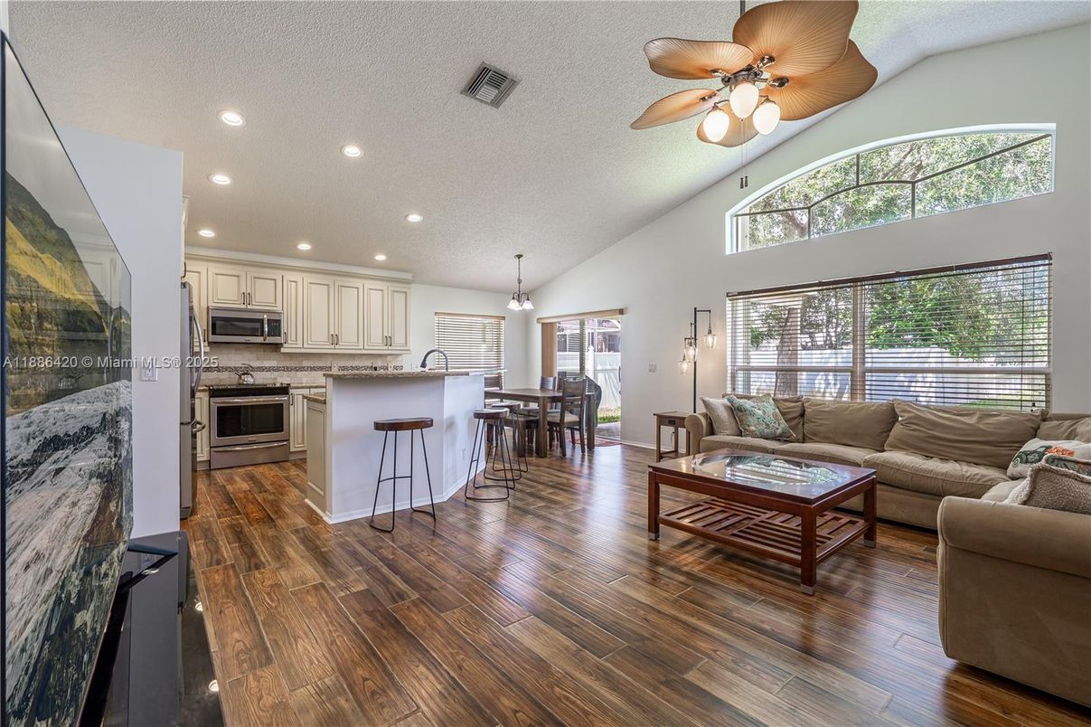 Dining room, Interior, Kitchen, Living room, Pendant Lights, Recessed Lighting, Stainless Steel Appliances, Wood Texture Flooring