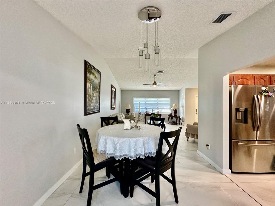 Dining room, Interior, Kitchen, Marble, Pendant Lights, Stainless Steel Appliances