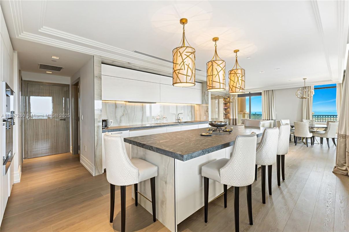 Chandelier, Dining room, Interior, Kitchen, Pendant Lights, Recessed Lighting, Stainless Steel Appliances, Water, Wood Texture Flooring