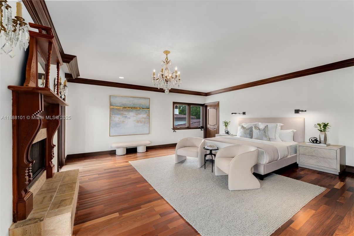 Bedroom, Chandelier, Fireplace, Interior, Recessed Lighting, Wood Texture Flooring