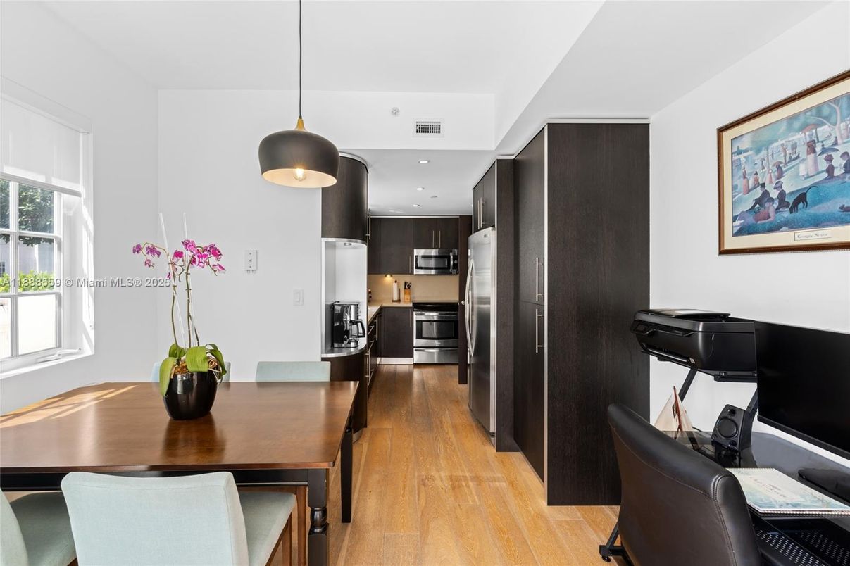 Dining room, Interior, Kitchen, Pendant Lights, Recessed Lighting, Stainless Steel Appliances, Wood Texture Flooring