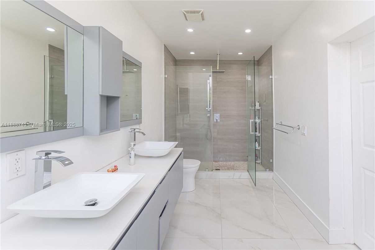 Bathroom, Dual Sink Vanities, Glass Shower, Interior, Marble, Recessed Lighting