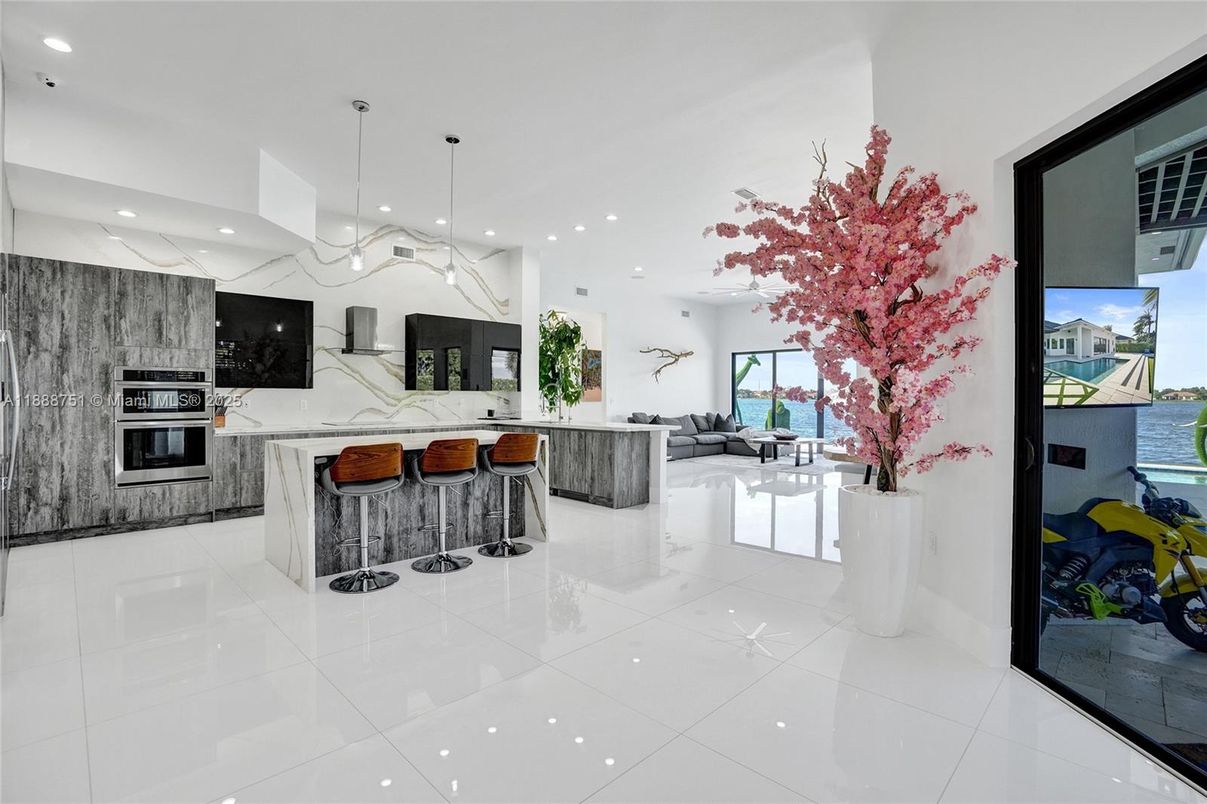 Interior, Kitchen, Marble Walls, Pendant Lights, Recessed Lighting, Stainless Steel Appliances, Water