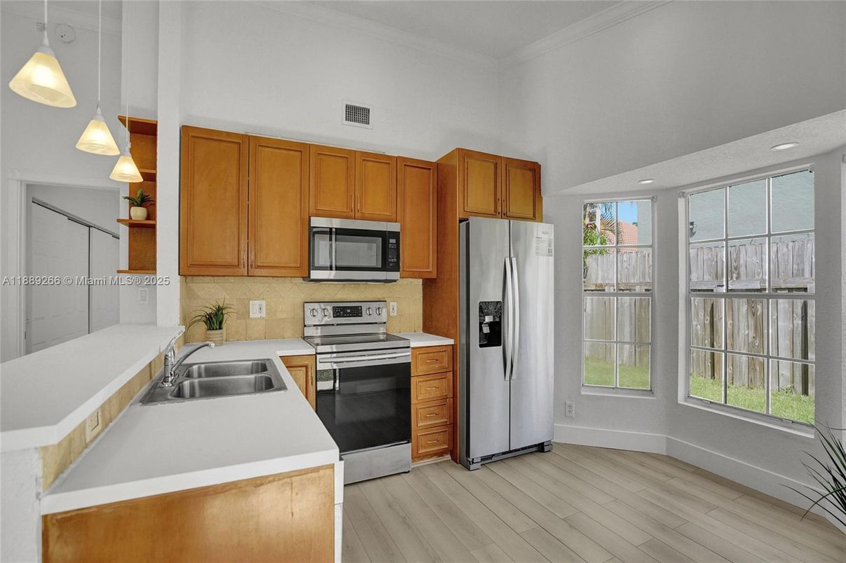 Interior, Kitchen, Pendant Lights, Recessed Lighting, Stainless Steel Appliances, Wood Texture Flooring