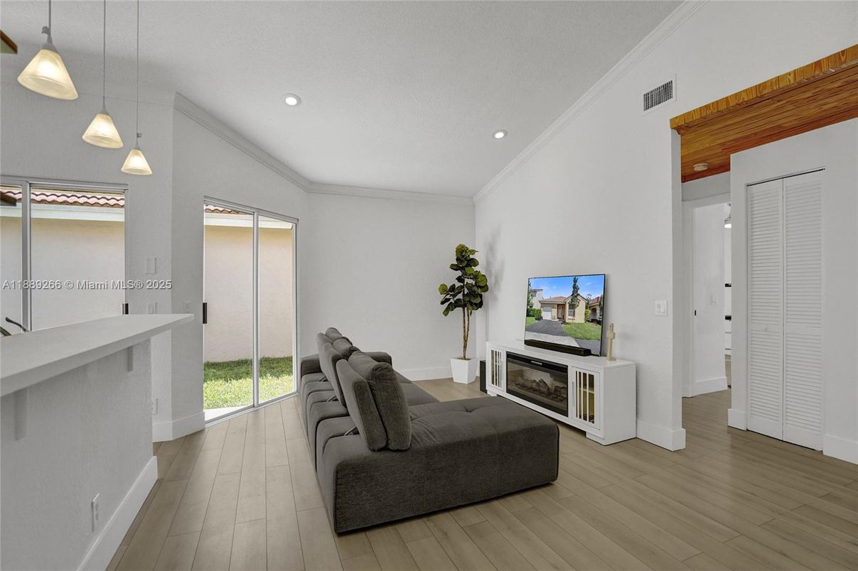 Fireplace, Interior, Pendant Lights, Recessed Lighting, Wood Texture Flooring