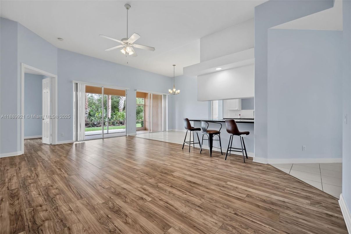 Chandelier, Dining room, Empty room, Interior, Kitchen, Recessed Lighting, Wood Texture Flooring
