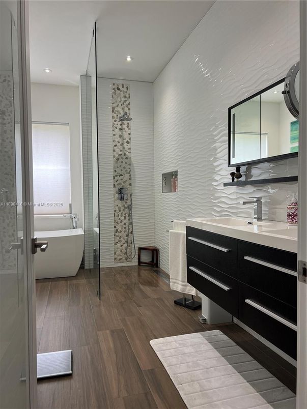 Bathroom, Free Standing Baths, Glass Shower, Interior, Recessed Lighting, Wood Texture Flooring