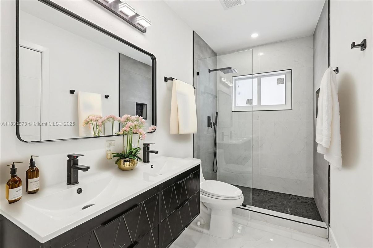 Bathroom, Dual Sink Vanities, Glass Shower, Interior, Marble Walls, Recessed Lighting