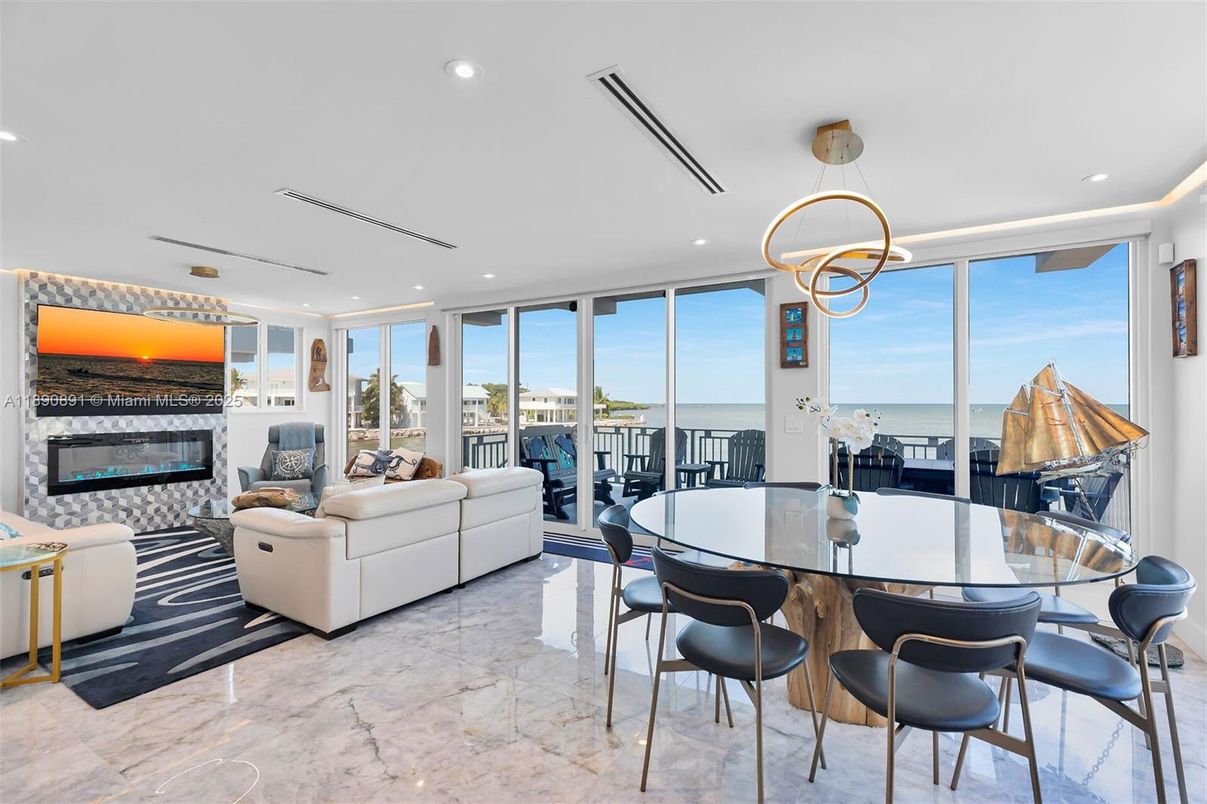 Dining room, Fireplace, Interior, Living room, Marble, Pendant Lights, Recessed Lighting, Water