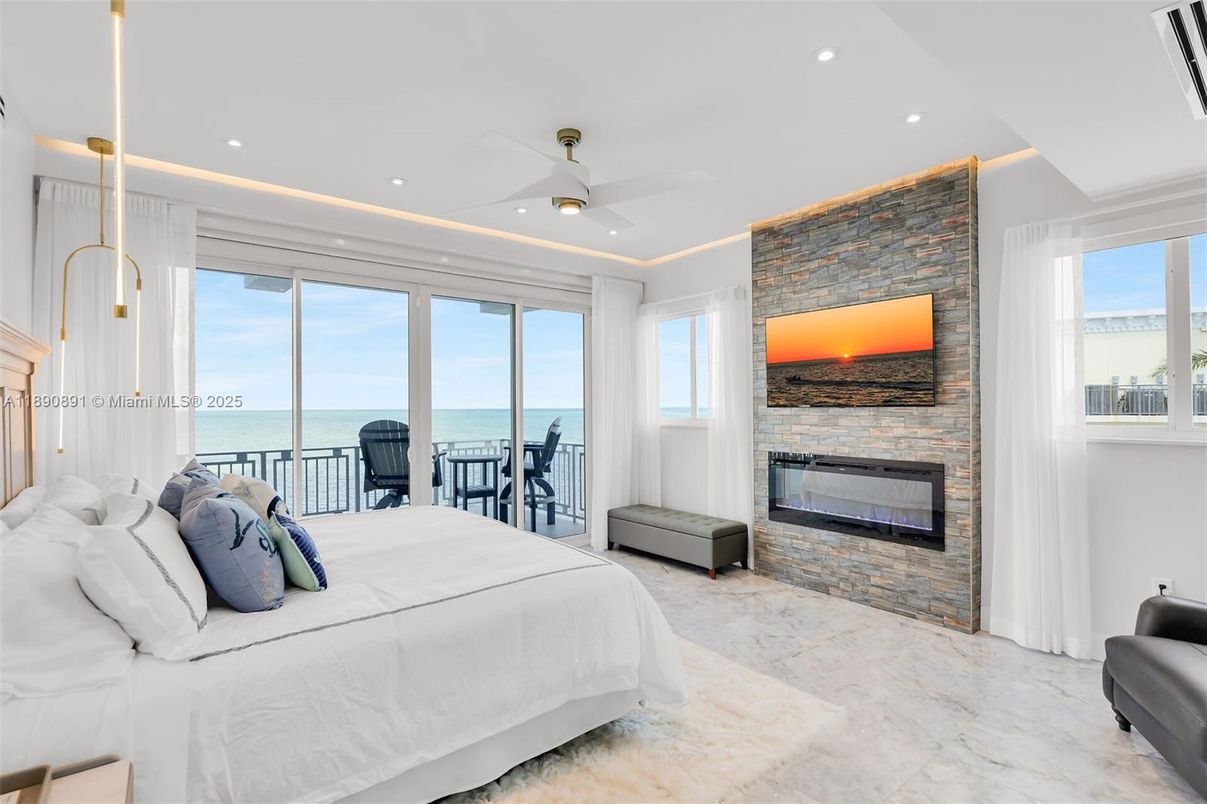 Bedroom, Fireplace, Interior, Marble, Recessed Lighting, Stone Walls, Water