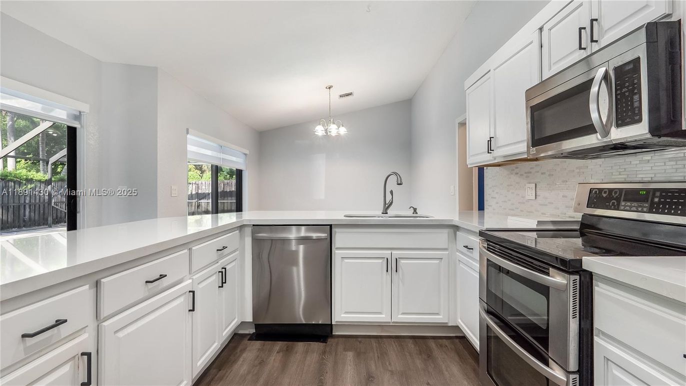 Chandelier, Interior, Kitchen, Pendant Lights, Stainless Steel Appliances, Wood Texture Flooring