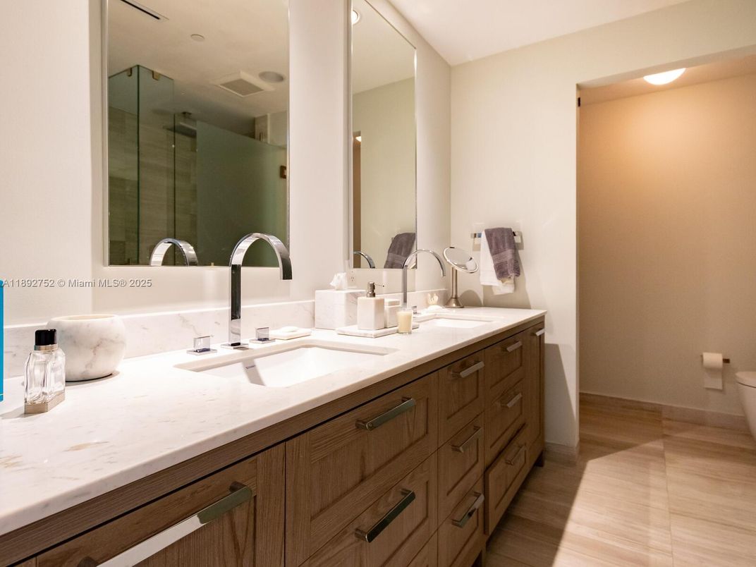 Bathroom, Dual Sink Vanities, Glass Shower, Interior, Recessed Lighting, Wood Texture Flooring