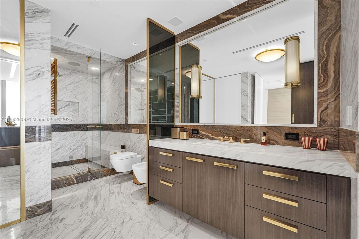 Bathroom, Dual Sink Vanities, Glass Shower, Interior, Marble, Marble Walls, Recessed Lighting