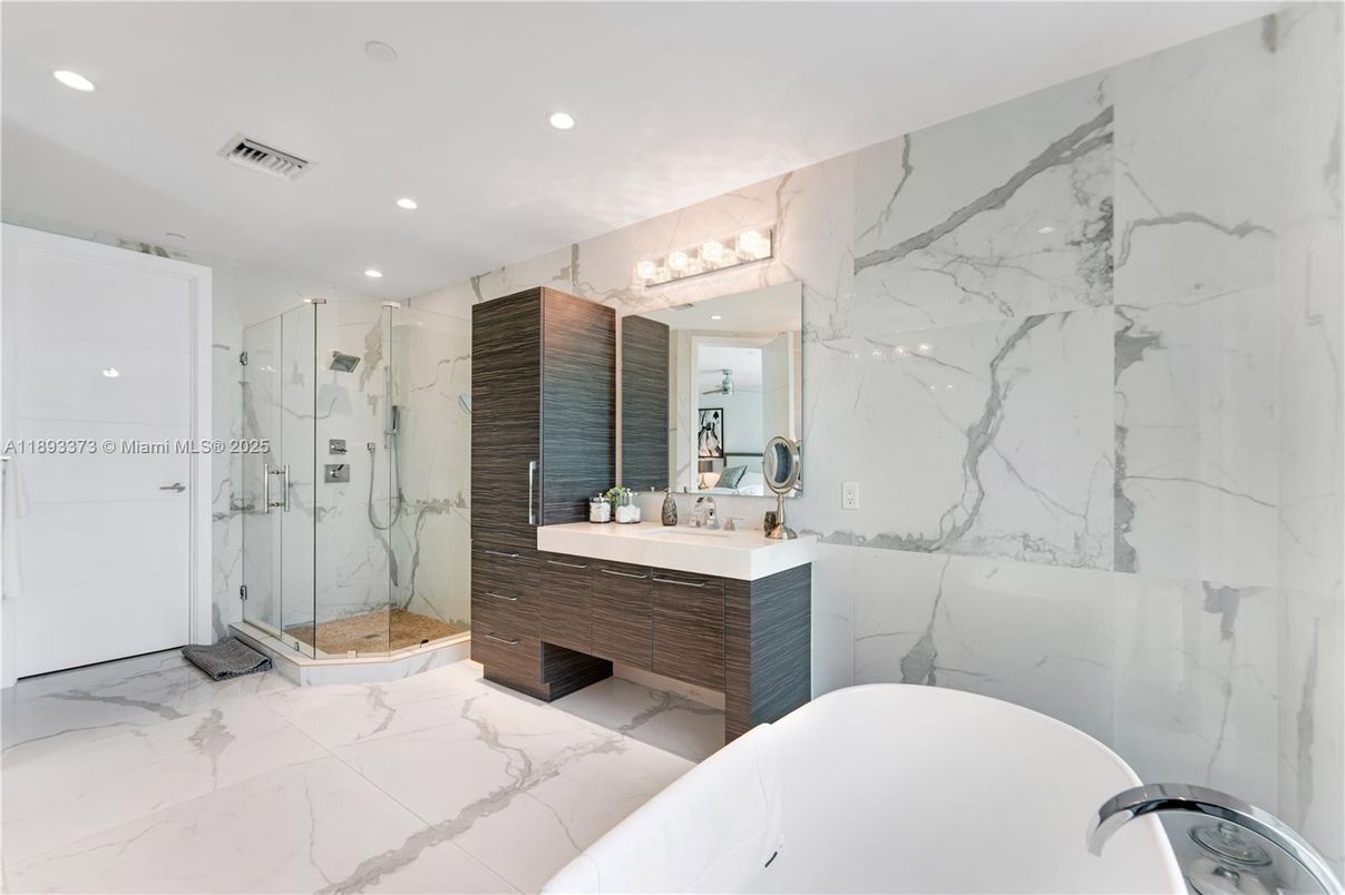 Bathroom, Dual Sink Vanities, Free Standing Baths, Glass Shower, Interior, Marble, Marble Walls, Recessed Lighting