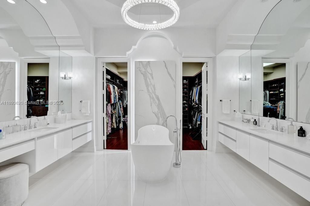 Bathroom, Dual Sink Vanities, Free Standing Baths, Interior, Marble, Marble Walls, Pendant Lights, Recessed Lighting, Walk-in Closets