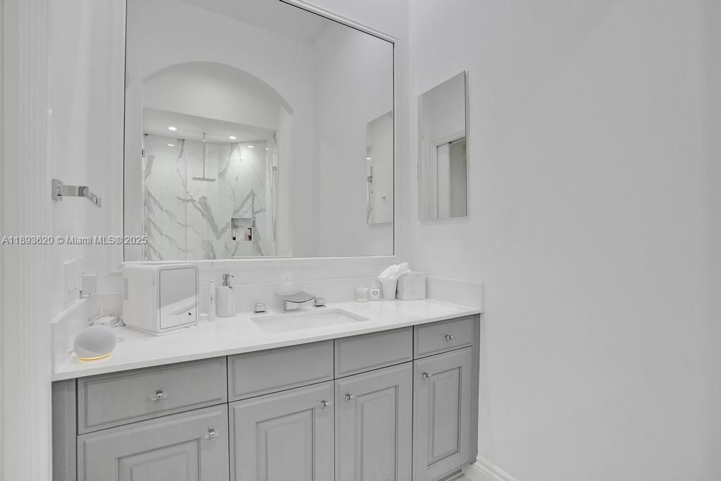 Bathroom, Dual Sink Vanities, Interior, Marble Walls, Recessed Lighting