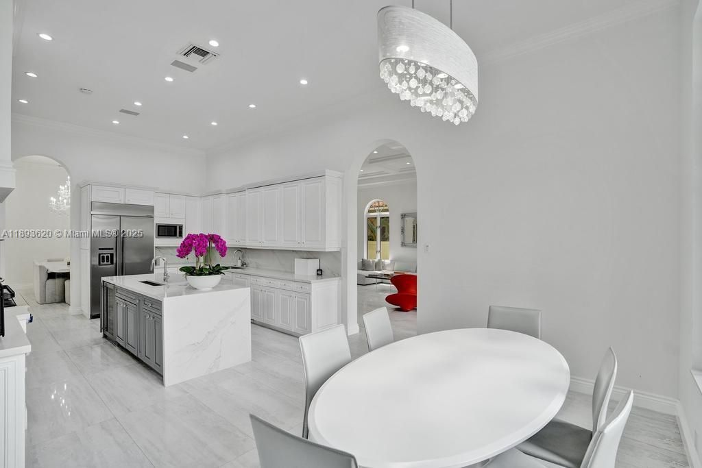Chandelier, Dining room, Interior, Kitchen, Marble, Recessed Lighting, Stainless Steel Appliances