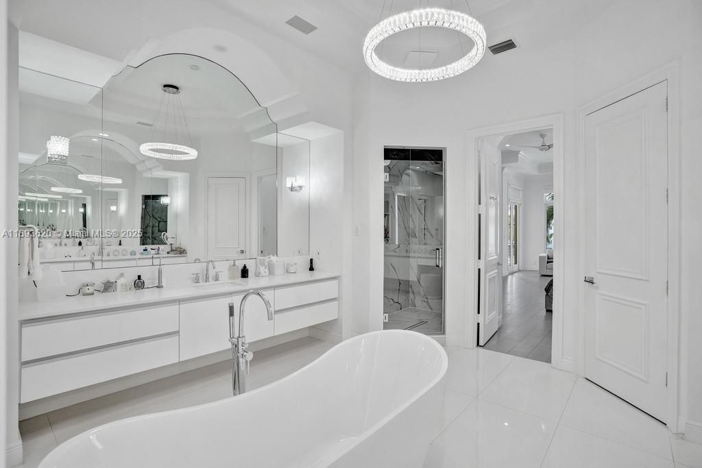 Bathroom, Dual Sink Vanities, Free Standing Baths, Glass Shower, Interior, Pendant Lights, Wood Texture Flooring