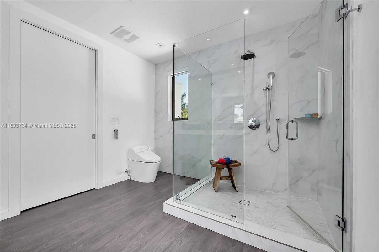 Bathroom, Glass Shower, Interior, Marble Walls, Recessed Lighting, Wood Texture Flooring