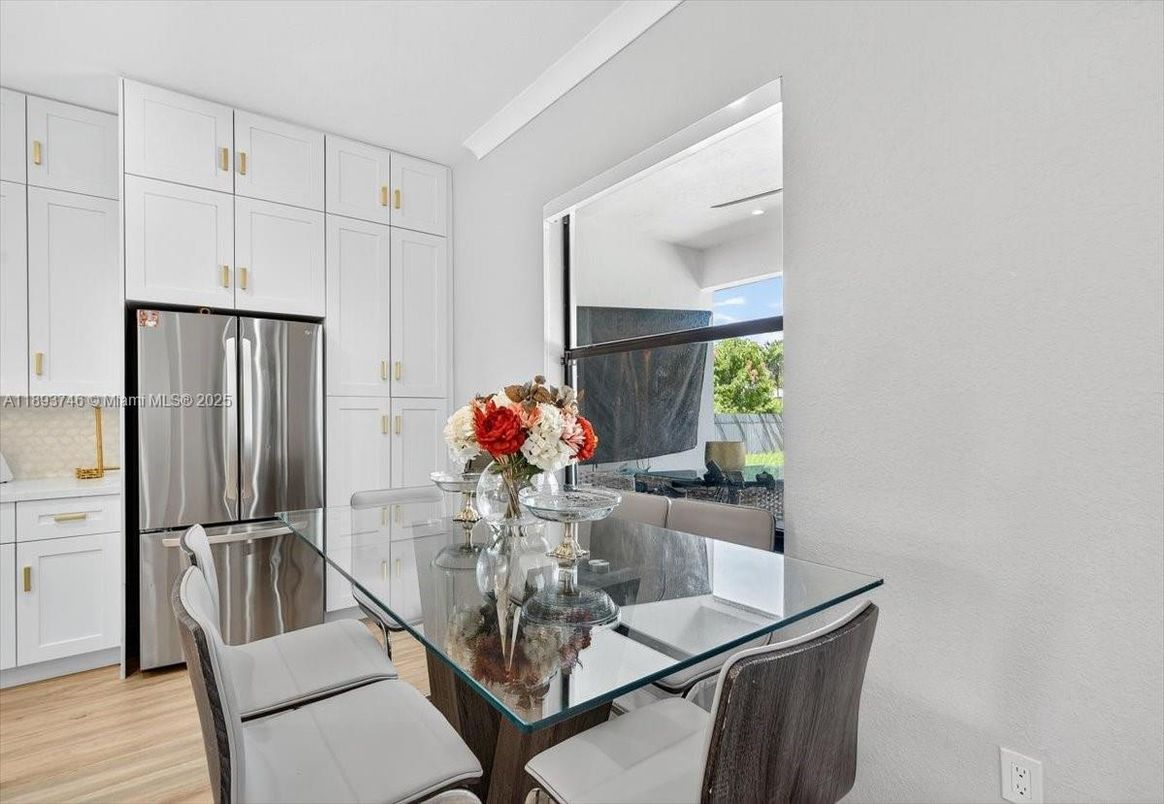 Dining room, Interior, Kitchen, Recessed Lighting, Stainless Steel Appliances, Wood Texture Flooring