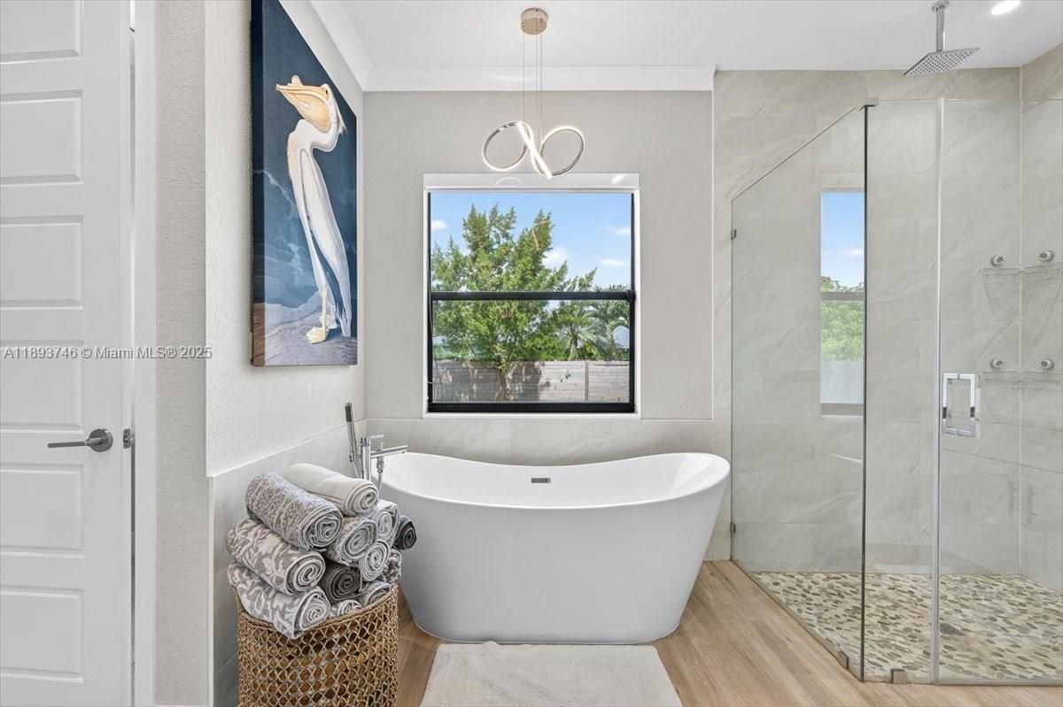 Bathroom, Free Standing Baths, Glass Shower, Interior, Pendant Lights, Wood Texture Flooring