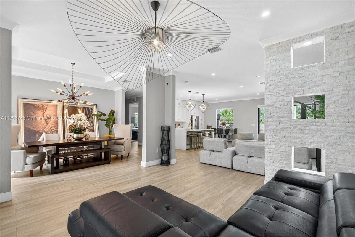 Dining room, Interior, Kitchen, Living room, Pendant Lights, Recessed Lighting, Stone Walls, Wood Texture Flooring