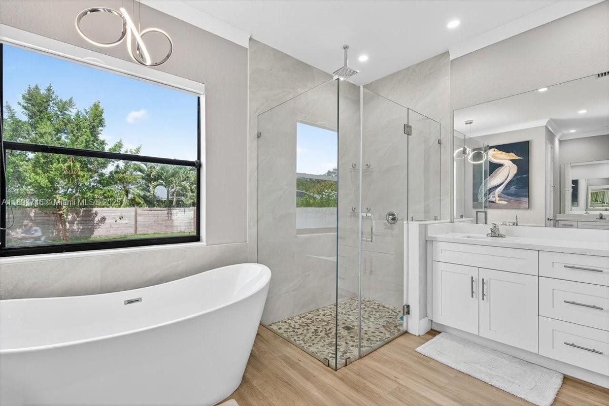 Bathroom, Free Standing Baths, Glass Shower, Interior, Recessed Lighting, Wood Texture Flooring