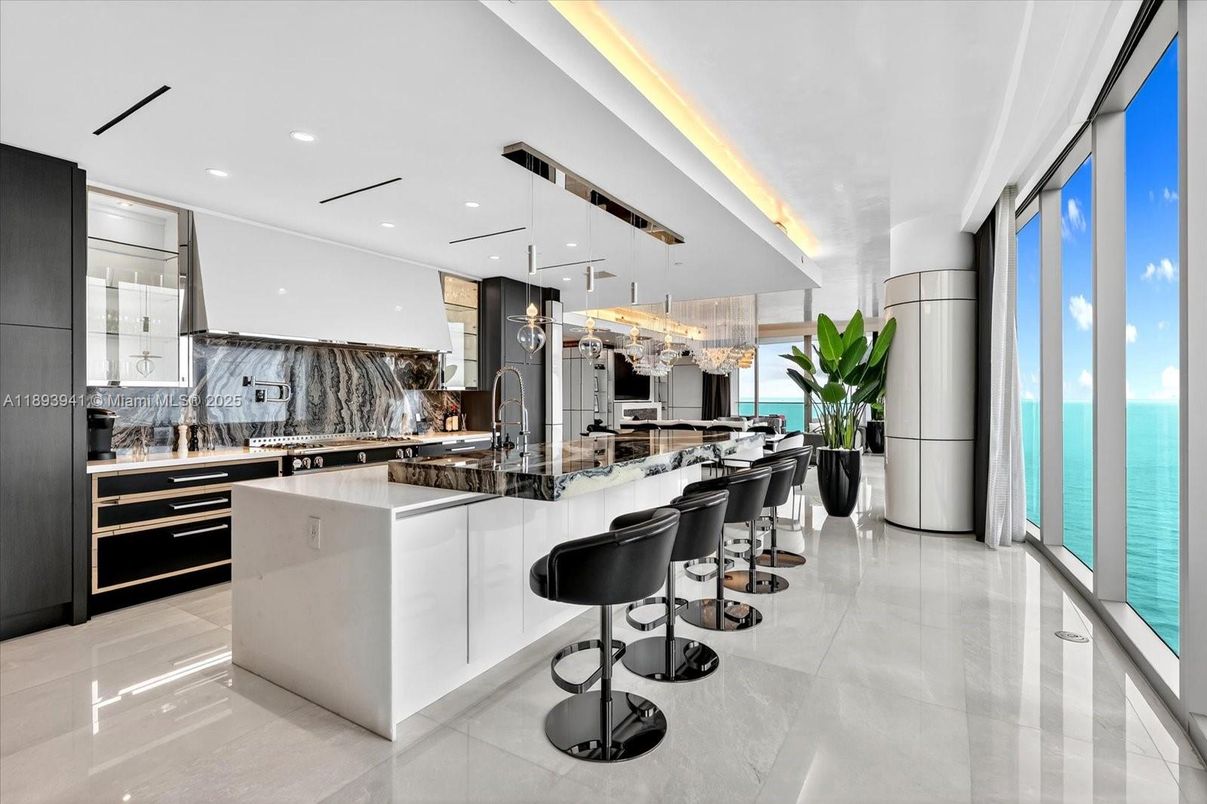 Interior, Kitchen, Marble Walls, Pendant Lights, Recessed Lighting, Stainless Steel Appliances, Water