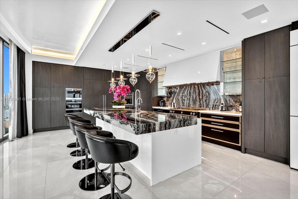 Interior, Kitchen, Marble Walls, Pendant Lights, Recessed Lighting, Stainless Steel Appliances