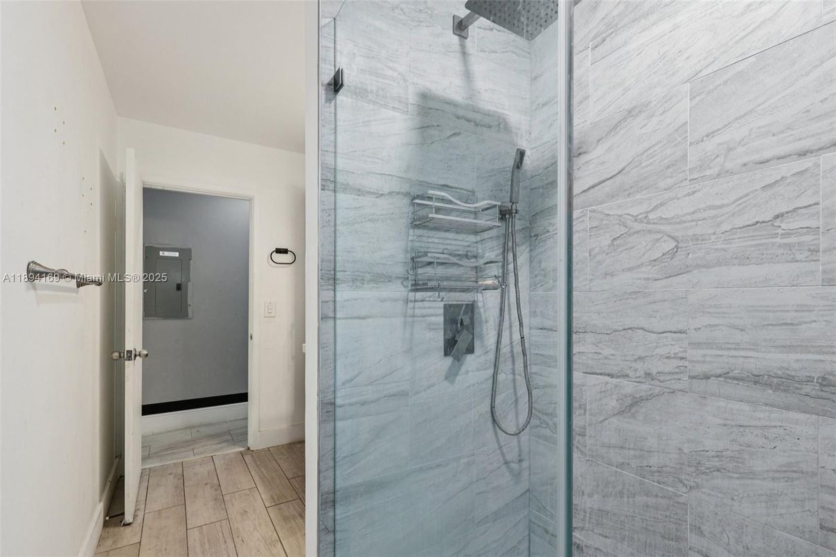 Bathroom, Glass Shower, Interior, Marble Walls, Wood Texture Flooring