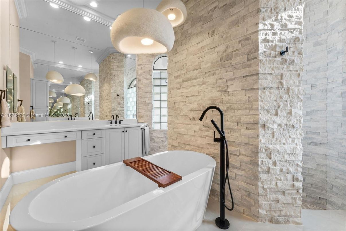 Bathroom, Dual Sink Vanities, Free Standing Baths, Interior, Pendant Lights, Recessed Lighting, Stone Walls