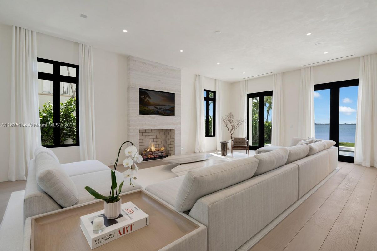 Fireplace, Interior, Living room, Recessed Lighting, Water, Wood Texture Flooring