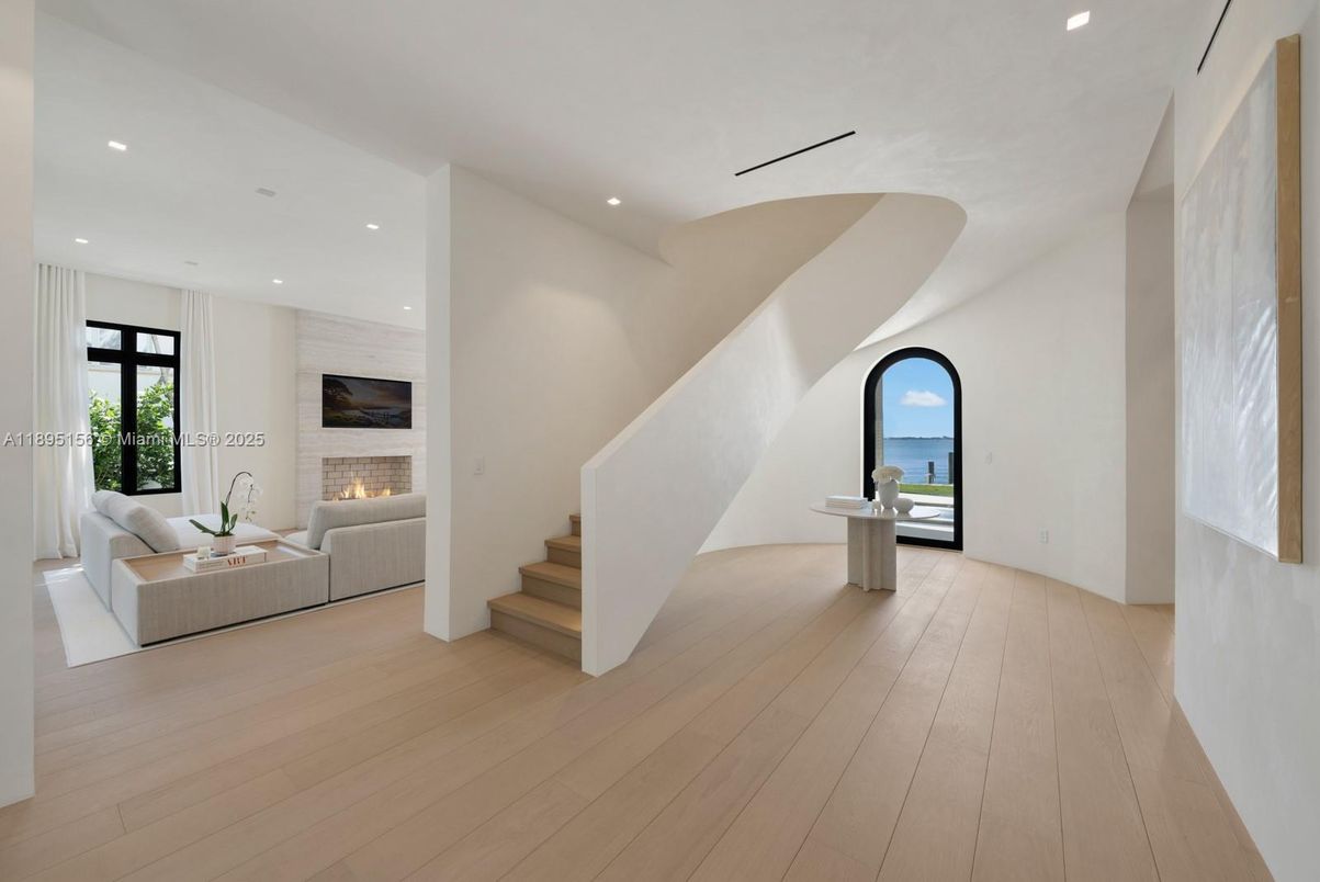 Fireplace, Interior, Living room, Recessed Lighting, Water, Wood Texture Flooring