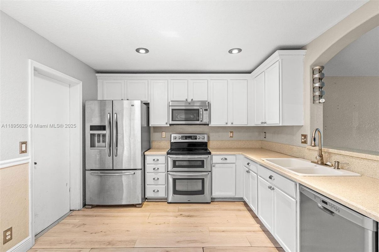 Interior, Kitchen, Recessed Lighting, Stainless Steel Appliances, Wood Texture Flooring