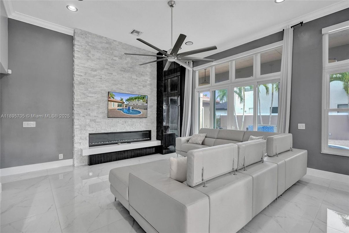 Fireplace, Interior, Living room, Marble, Recessed Lighting, Stone Walls