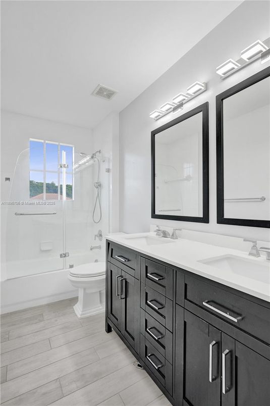 Bathroom, Dual Sink Vanities, Glass Shower, Interior, Wood Texture Flooring