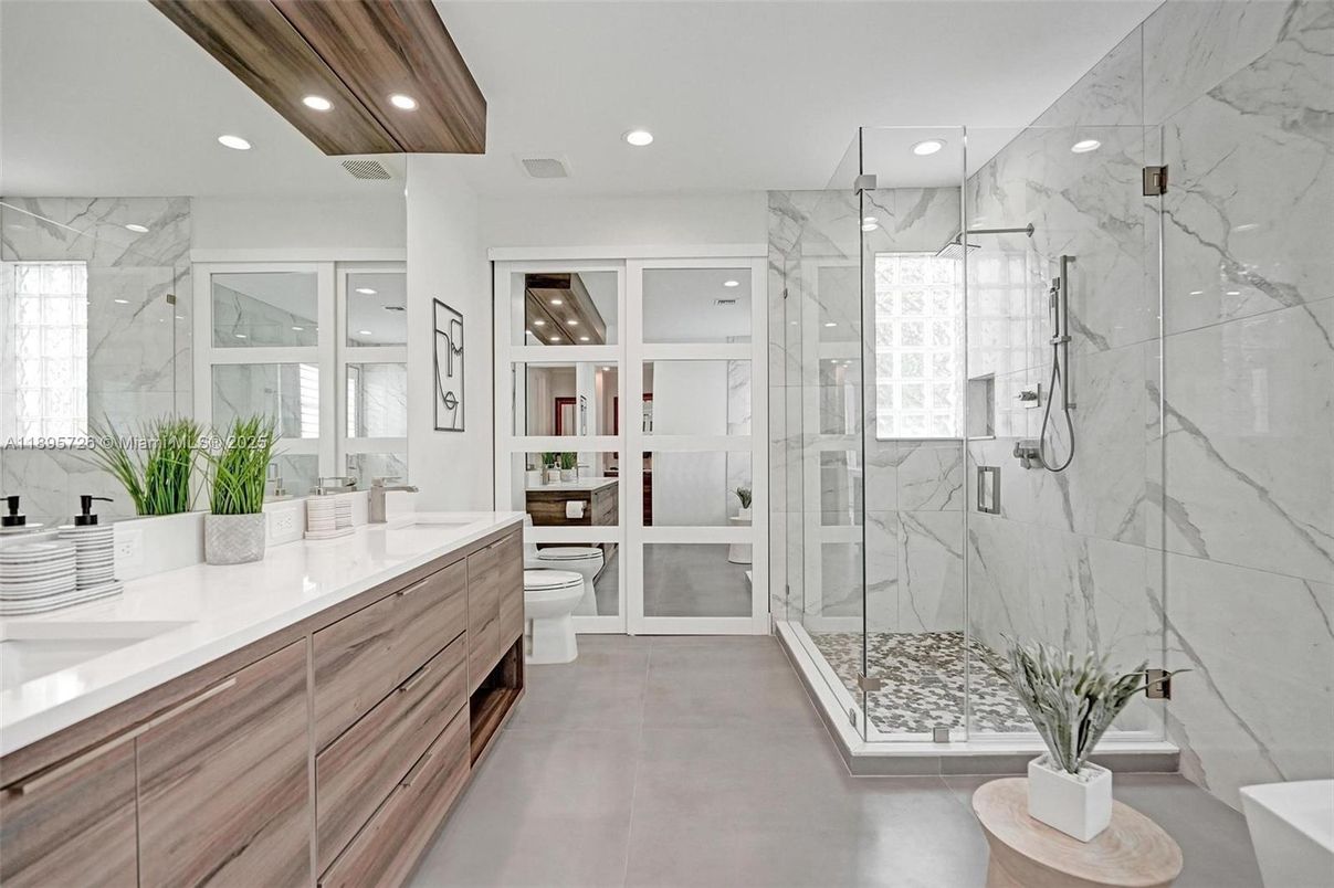 Bathroom, Dual Sink Vanities, Glass Shower, Interior, Marble Walls, Recessed Lighting