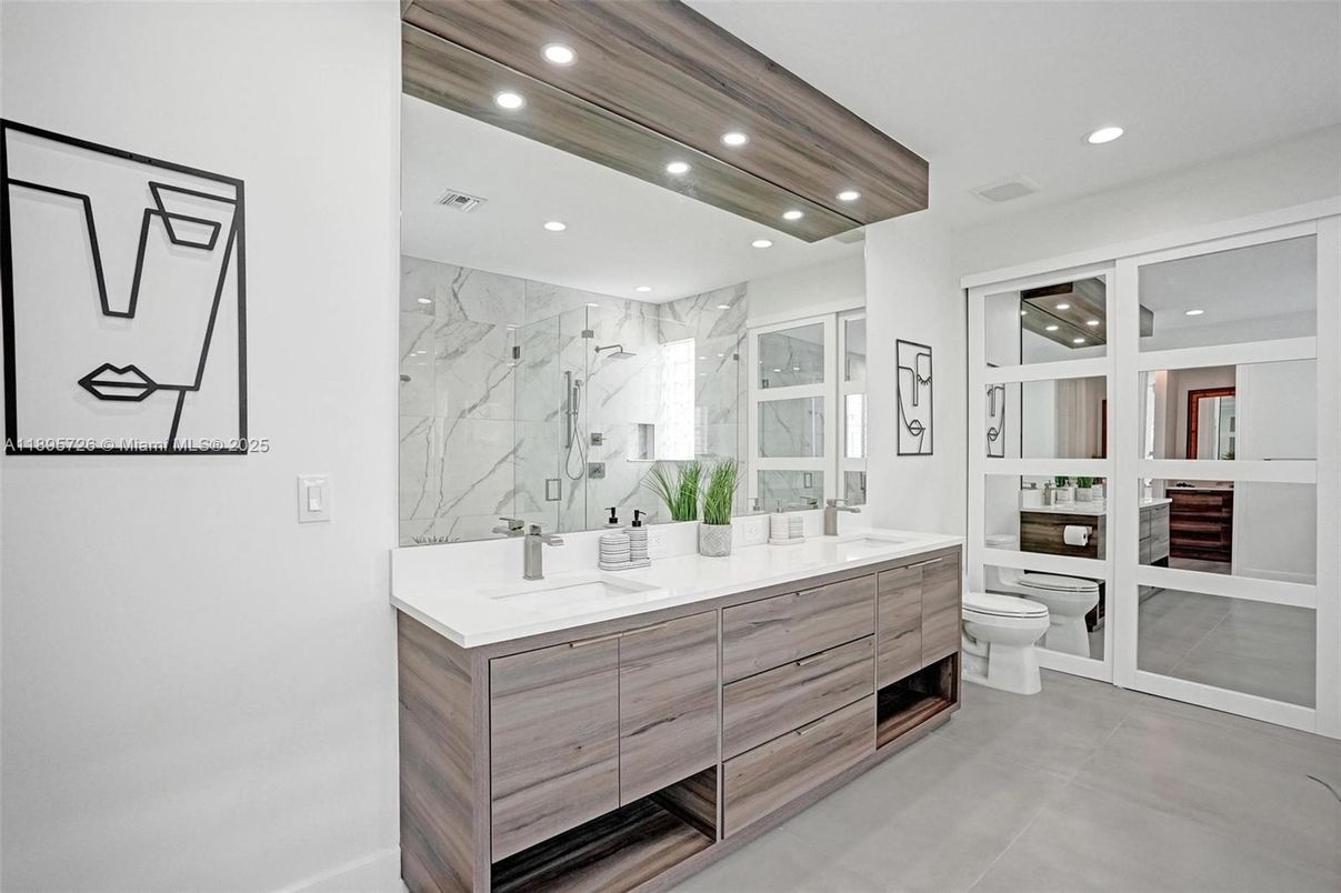 Bathroom, Dual Sink Vanities, Interior, Marble Walls, Recessed Lighting
