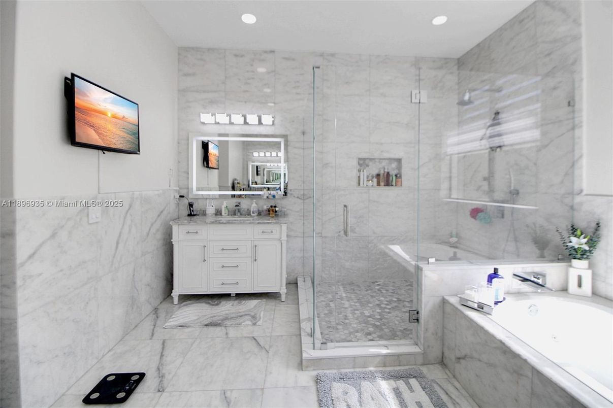 Bathroom, Dual Sink Vanities, Glass Shower, Interior, Marble, Marble Walls, Recessed Lighting