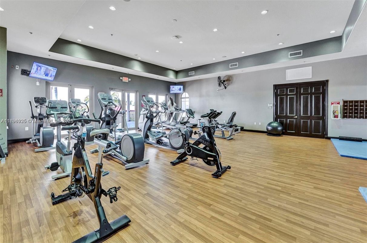Fitness Equipment, Gym, Interior, Recessed Lighting, Wood Texture Flooring